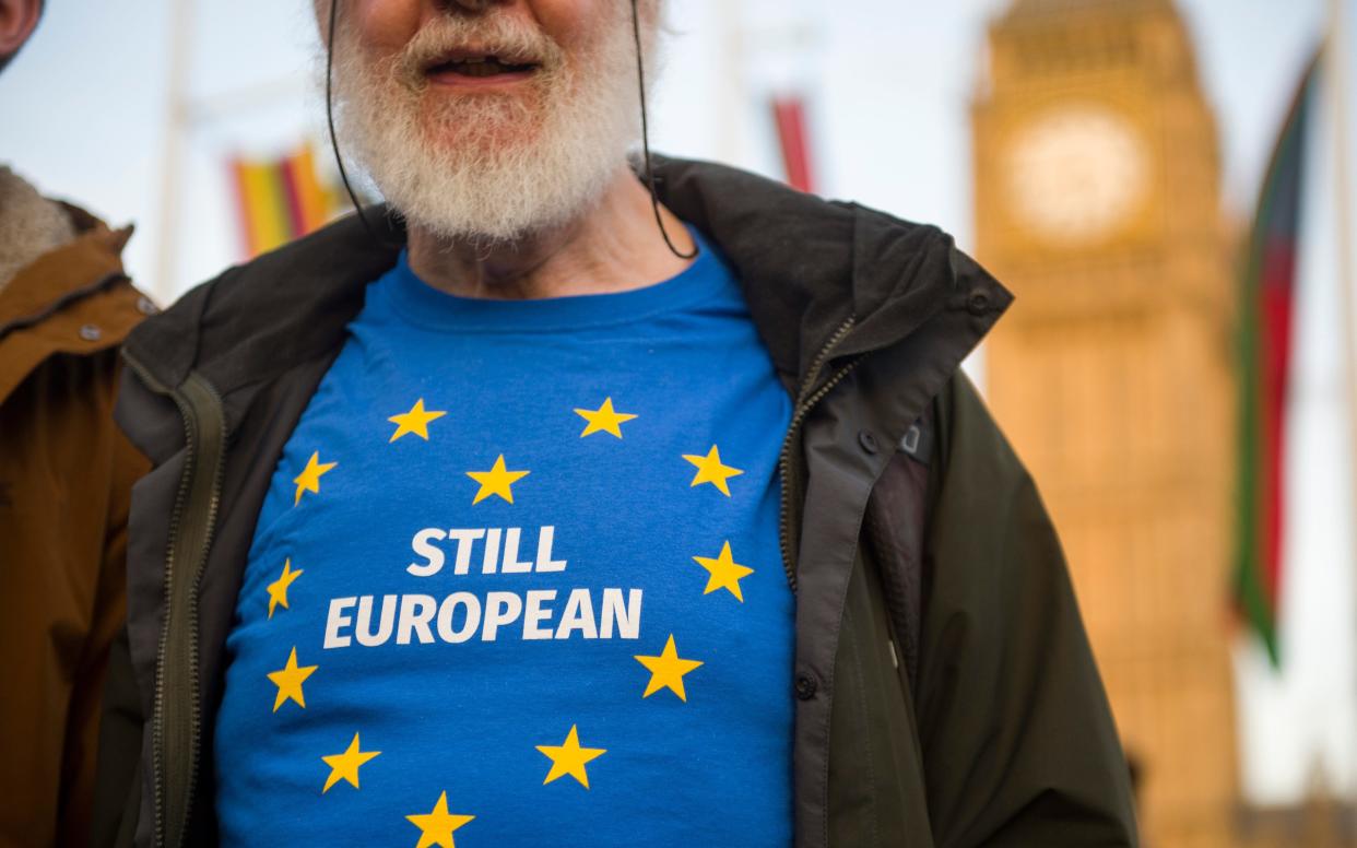 A protester wearing a pro-EU t-shirt outside  - Paul Grover