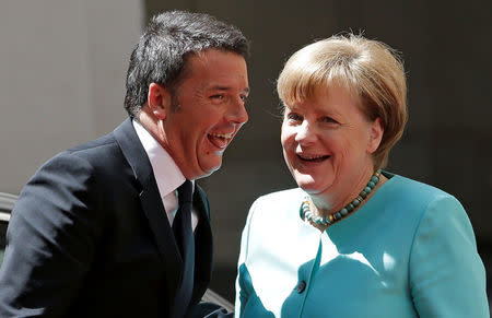 Italian Prime Minister Matteo Renzi (L) greets German Chancellor Angela Merkel at Chigi palace in Rome May 5, 2016. REUTERS/Max Rossi TPX IMAGES OF THE DAY