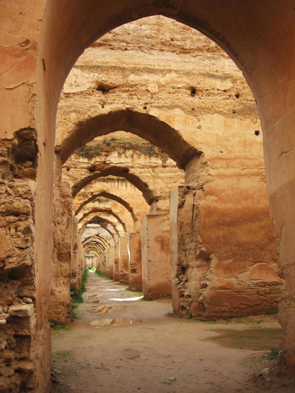 This January 2013 photo shows the ruins of the gigantic late 17th-century royal stables in Meknes, one of Morocco's former imperial capitals. With tourists thronging the shops in the city's medina, historical monuments can sometimes seem eerily empty. (AP Photo/Giovanna Dell'Orto)