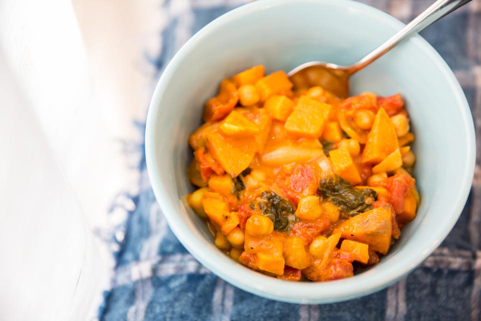 Coconut curry dish in a white bowl