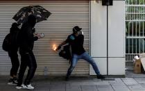 Anti-government demonstrators attend a protest march in Hong Kong