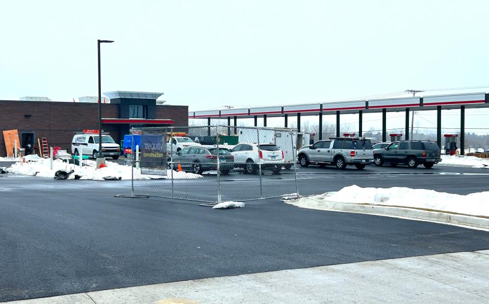 Crews put the finishing touches on the QuikTrip Travel Center Thursday, Jan. 24, 2024, at the corner East State Street and Lyford Road in Rockford. The store is expected to open later this year.