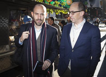 Dick Costolo (R), Twitter's Chief Executive, arrives at Morgan Stanley as part of the Twitter Roadshow in advance of the firm's IPO, in New York, October 25, 2013. REUTERS/Carlo Allegri