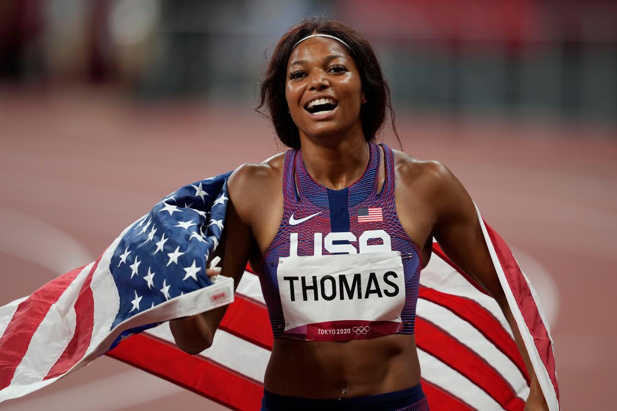 American Gabby Thomas celebrates after winning the bronze medal in the women's 200 meters at the Tokyo Olympics on Aug. 2, 2021.