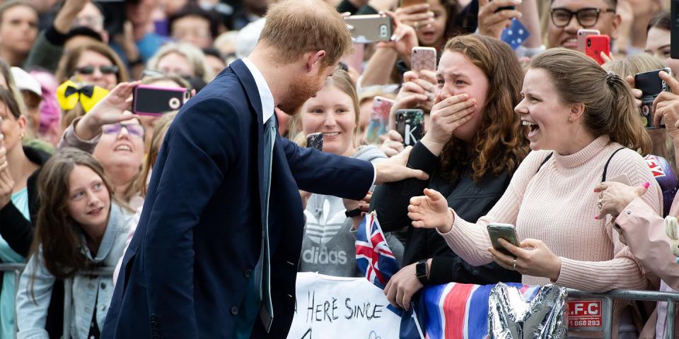 <p>Prince Harry meets his <a rel="nofollow noopener" href="https://www.harpersbazaar.com/celebrity/latest/a23882821/prince-harry-royal-tour-meets-crying-fan-meghan-markle/" target="_blank" data-ylk="slk:Number One Fan;elm:context_link;itc:0;sec:content-canvas" class="link ">Number One Fan</a>.</p>