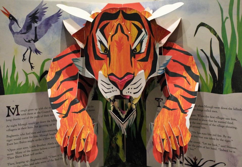 A 3D tiger, created by Matthew Reinhart, leaps from a display of art at the NCCIL. Reinhart's work was exhibited in 2009, and he will be back in Abilene in April for the premiere of a documentary on the 25-year-old art center