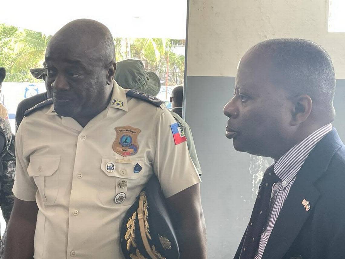 Haiti National Police Director General Frantz Elbé, left, talks with Todd Robinson, assistant secretary of state in charge of the Bureau of International Narcotics and Law Enforcement Affairs in the Biden administration, during a January 2023 visit to Port-au-Prince.
