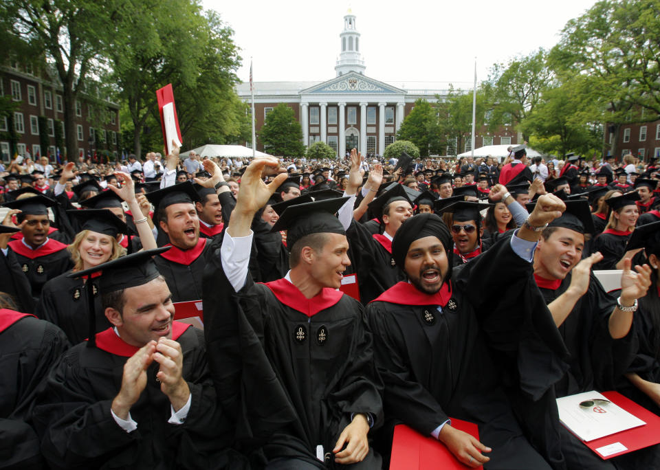 <em>Harvard Business School students cheer during their graduation ceremonies in Boston, Massachusetts following Harvard University’s 358th Commencement June 4, 2009. REUTERS/Brian Snyder</em>