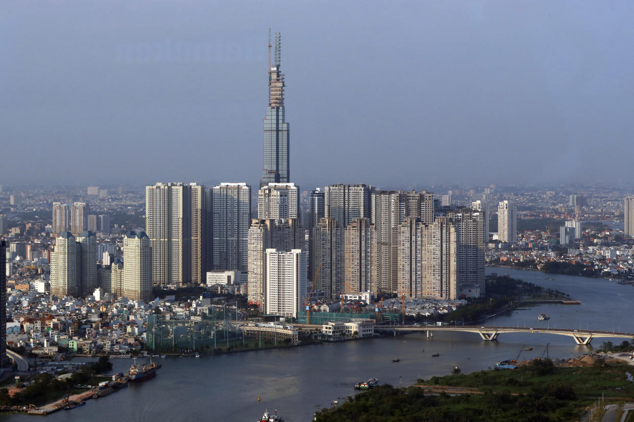 Saigon river and cityscape of Ho Chin Minh Skyline.  Saigon. Vietnam.  (Photo by: Godong/Universal Images Group via Getty Images)