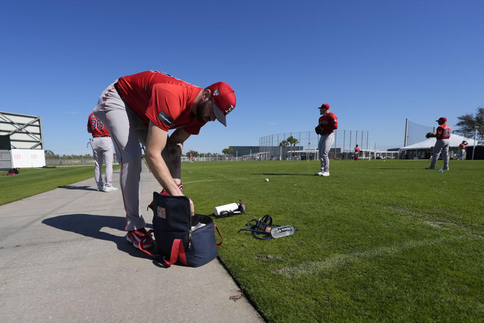Red Sox pitcher Lucas Giolito readies for a bullpen workout during spring training in Fort Myers, Fla., Thursday, Feb. 15, 2024. (AP Photo/Gerald Herbert)