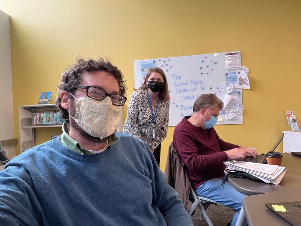 The Columbus Dispatch Assistant Metro Editor Ryan Smith takes a selfie while at the Driving Park library branch Mobile Newsroom with reporters Danae King and Mark Ferenchik.