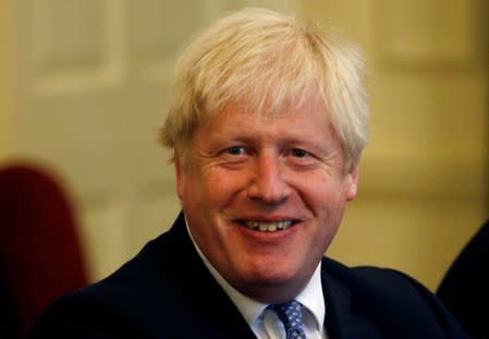 FILE PHOTO: British PM Johnson attends a roundtable at Downing Street in London