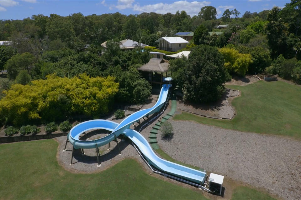 <p>The mega 164ft-long slide snakes its way through the gardens of the sprawling mansion in the northern suburbs of Brisbane. The property is on the market for A$1.075m – that’s about £614,000, less than the price of an average house in London. </p>