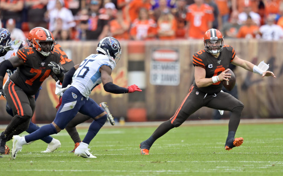 Cleveland Browns quarterback Baker Mayfield (6) scrambles during the first half in an NFL football game against the Tennessee Titans, Sunday, Sept. 8, 2019, in Cleveland. (AP Photo/David Richard)