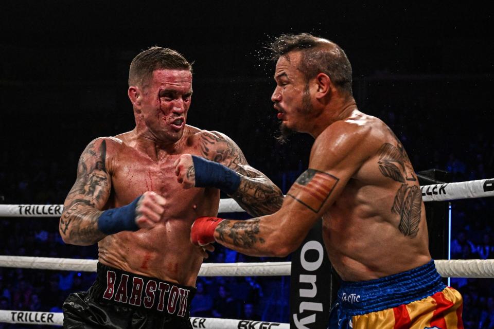 Andrew Angelcor, left, of Barstow, connects a punch against Van Vo at BKFC 31 on Oct. 15, 2022.