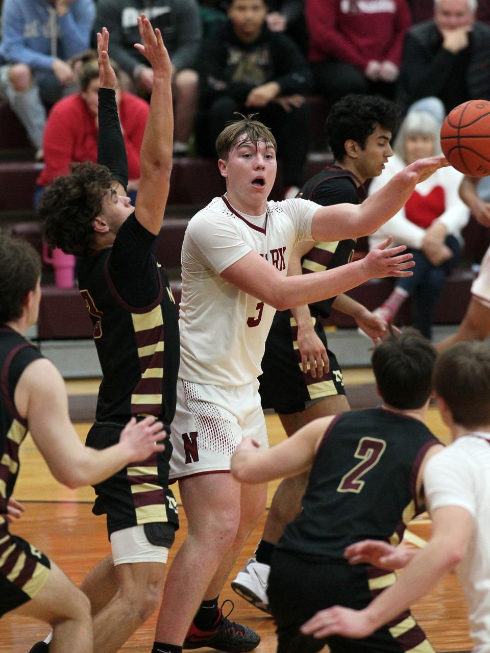 Newark junior Steele Meister passes out of the paint during the Wildcats' 58-36 victory over New Albany at Jimmy Allen Gymnasium on Friday, Feb. 24, 2023, advancing them to the Division I district semifinals Wednesday against Gahanna. Meister scored 18 points.