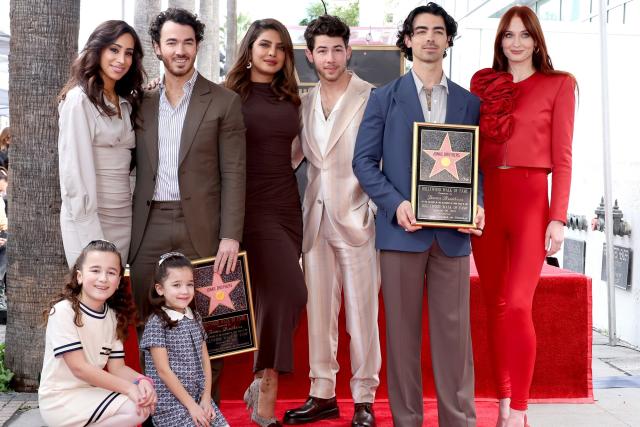 Joe Jonas And Sophie Turner Match In Red As Guests Wear White At