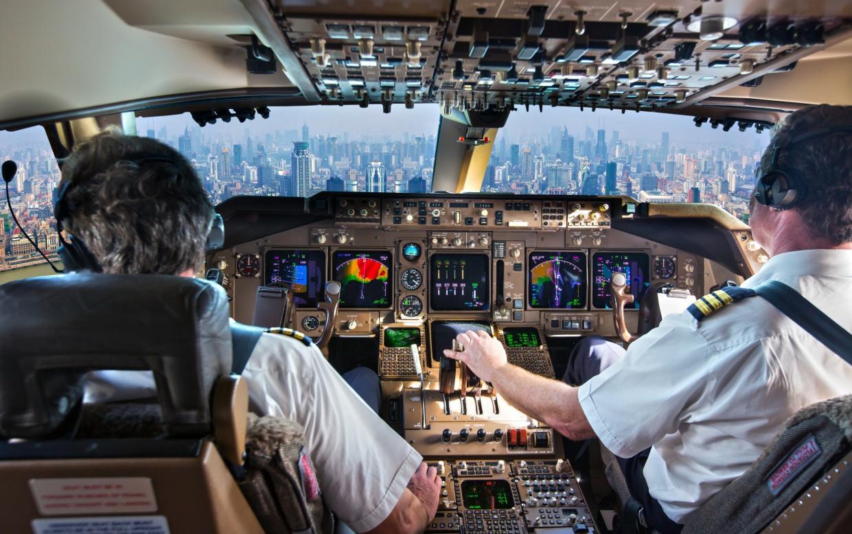 pilots in cockpit