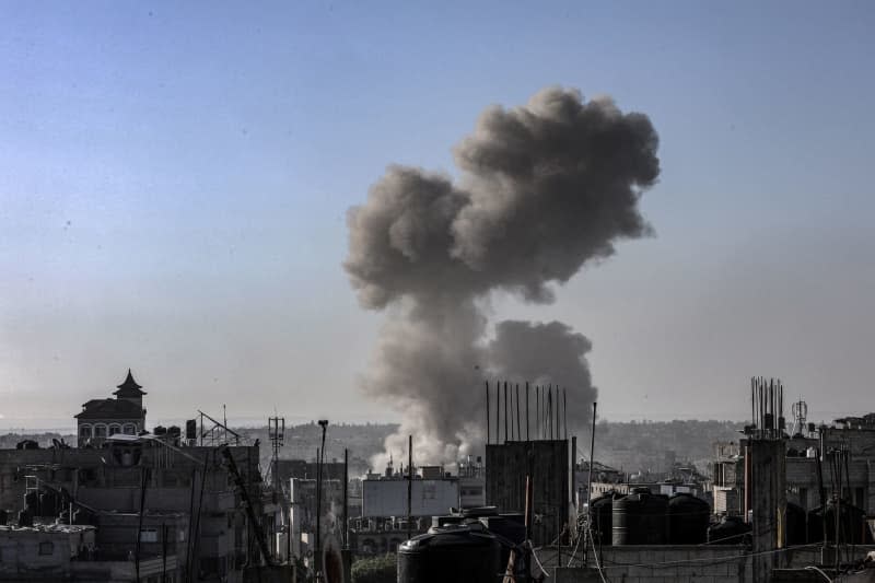 Smoke rises following Israeli air strikes on Al-Jeneina and Al-Salam neighbourhoods. Abed Rahim Khatib/dpa