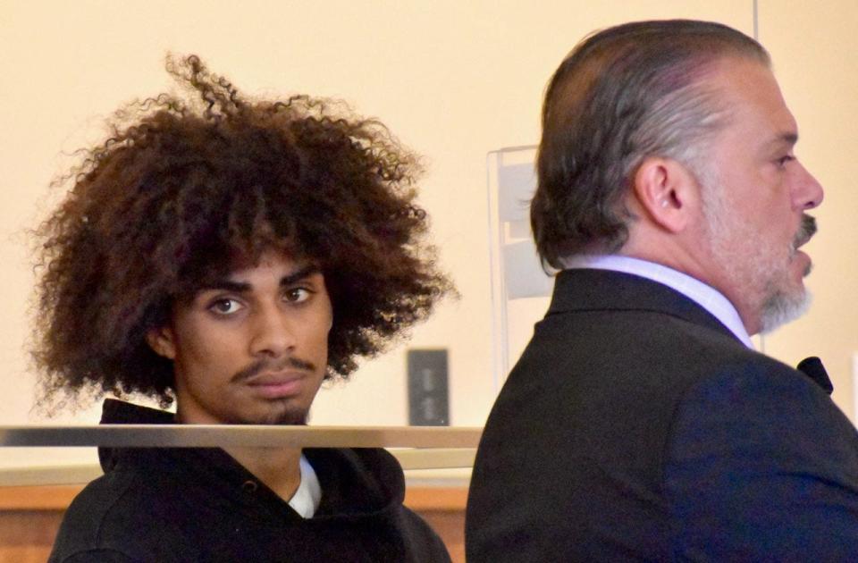 Xzavien Figueroa-Valcarel, of Fall River, left, seen with his attorney, Frank Camera, was charged in Fall River District Court Monday, March 18, 2024, with accessory to murder-after the fact in the fatal shooting of Colus Jamal Mills-Good in Fall River on Thursday, March 14.