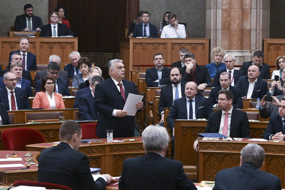 Hungary's Prime Minister Viktor Orban speaks in parliament, in Budapest, Hungary, Dec. 13, 2023. Hungary's prime minister says his government will block a proposal to start talks on European Union membership for Ukraine at a summit of the bloc’s leaders this week. Speaking to lawmakers in Hungary’s parliament Wednesday, Viktor Orbán said that the time for bringing Ukraine into the EU had “not yet come,” and that the development of a strategic partnership with Kyiv should be a prerequisite for beginning membership talks. (Szilard Koszticsak/MTI via AP)