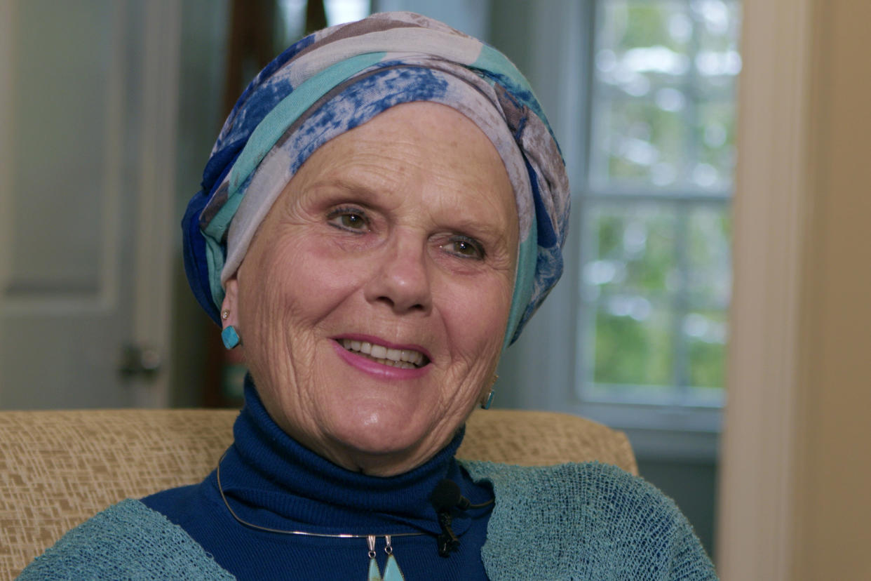 FILE - In this image taken from video, Lynda Shannon Bluestein smiles during an interview in the living room of her home, Feb. 28, 2023, in Bridgeport, Conn. The state of Vermont on Tuesday, May 2, 2023, became the first state in the country to change its medically assisted suicide law to allow terminally ill people from out of state to take advantage of it to end their lives. Bluestein and Diana Barnard, a physician, sued Vermont in federal court last summer, claiming its residency requirement violated the Constitution’s commerce, equal protection, and privileges and immunities clauses. Barnard specializes in hospice and palliative care and has patients from neighboring New York state, which, like Connecticut, doesn’t allow medically assisted suicide. (AP Photo/Rodrique Ngowi, File)