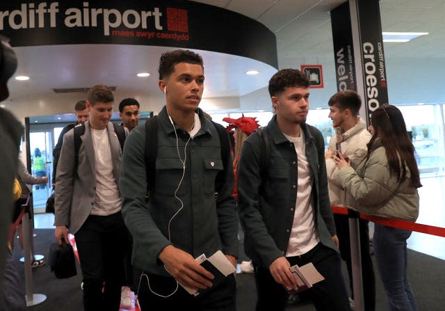 Wales’ Brennan Johnson and Neco Williams (right) departing for Qatar from Cardiff airport