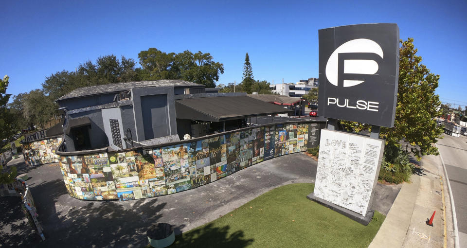 FILE - The former Pulse Nightclub —the site of the 2016 mass shooting that killed 49 patrons— sits south of downtown Orlando, Fla., Wednesday, Oct. 18, 2023. The city of Orlando purchased the nightclub property in 2023 for $2 million, and it has since outlined more modest plans for a memorial. (Joe Burbank/Orlando Sentinel via AP, File)