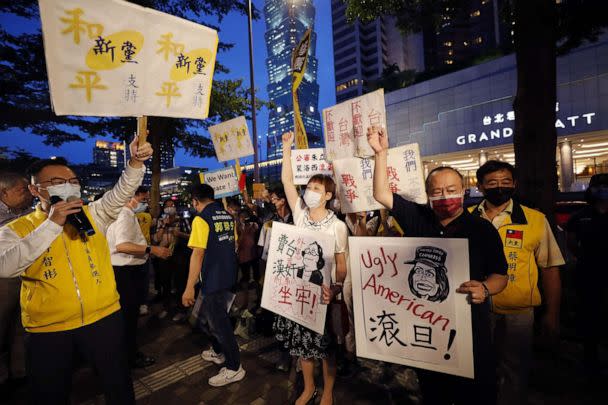 PHOTO: Demonstrators hold placards during a protest against the visit of U.S. House Speaker Nancy Pelosi, in Taipei, Taiwan, Aug. 2, 2022. (Ritchie B. Tongo/EPA via Shutterstock)