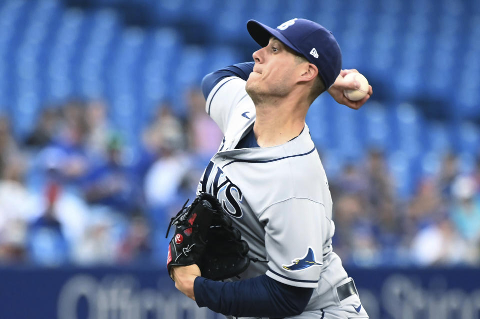 Tampa Bay Rays starting pitcher Matt Wisler throws to a Toronto Blue Jays batter during the first inning of a baseball game Thursday, June 30, 2022, in Toronto. (Jon Blacker/The Canadian Press via AP)