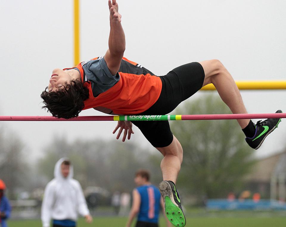 Sam Rehm competes in the high jump event on Tuesday for Sturgis.