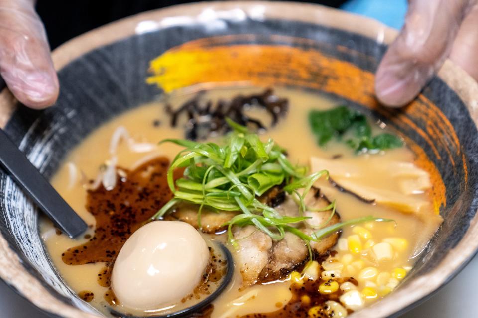 Black garlic tonkotsu ramen is prepared at Sizzling House in Mesa on June 27, 2023.