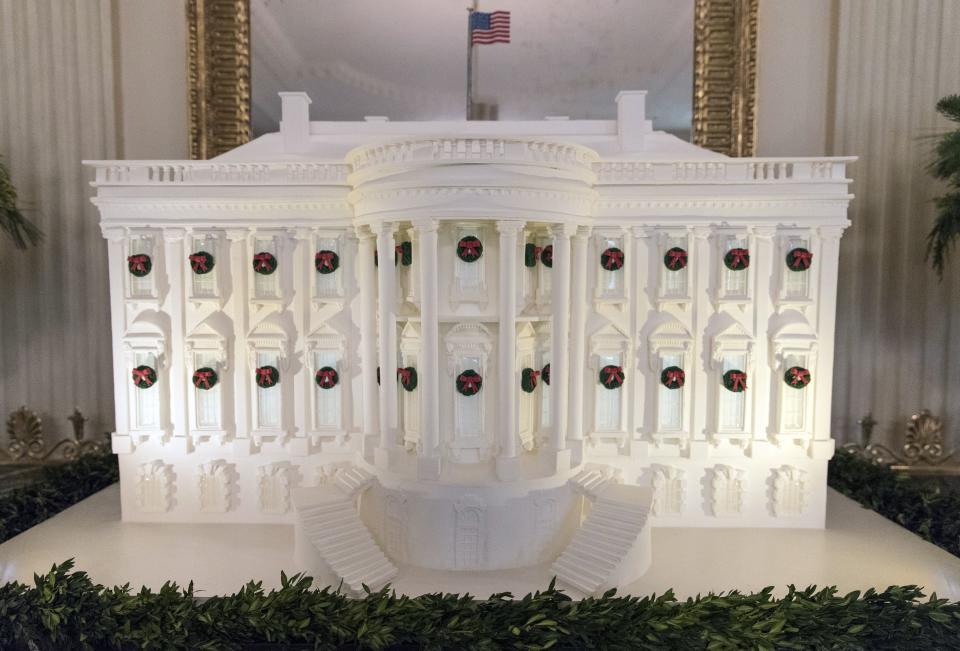 The gingerbread White House is seen in the East Dining Room during a media preview of the 2017 holiday decorations at the White House in Washington, D.C., Nov. 27, 2017.