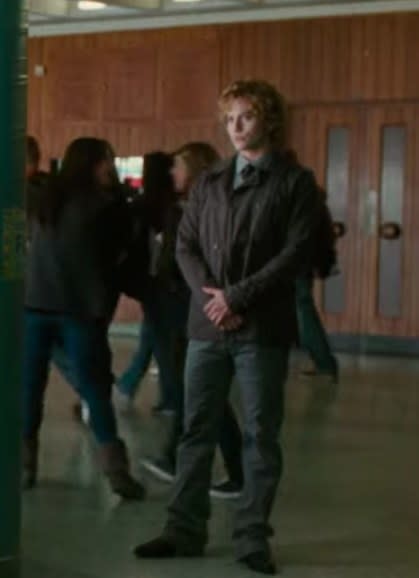 Jasper wearing jeans, a jacket, a shirt, and a tie