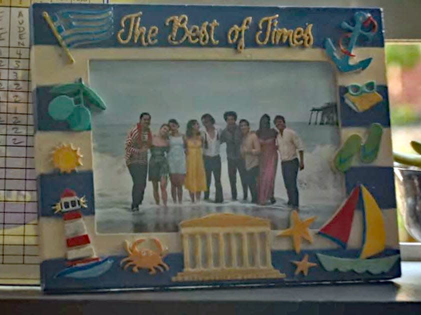 beach themed picture frame that reads the best of times with a photos of the characters form along for the ride