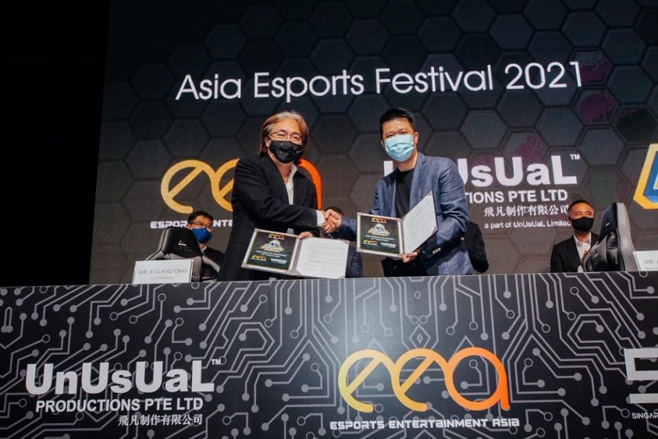 (Front from left) Ong and UnUsUaL Productions director of sales and pperation, Alan Meng. — Photo courtesy of Esports Entertainment Asia Pte Ltd