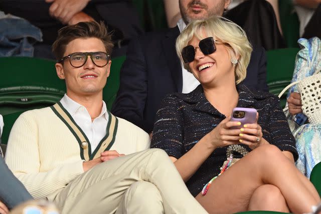 <p>Karwai Tang/WireImage</p> Oliver Cheshire and Pixie Lott at Wimbledon