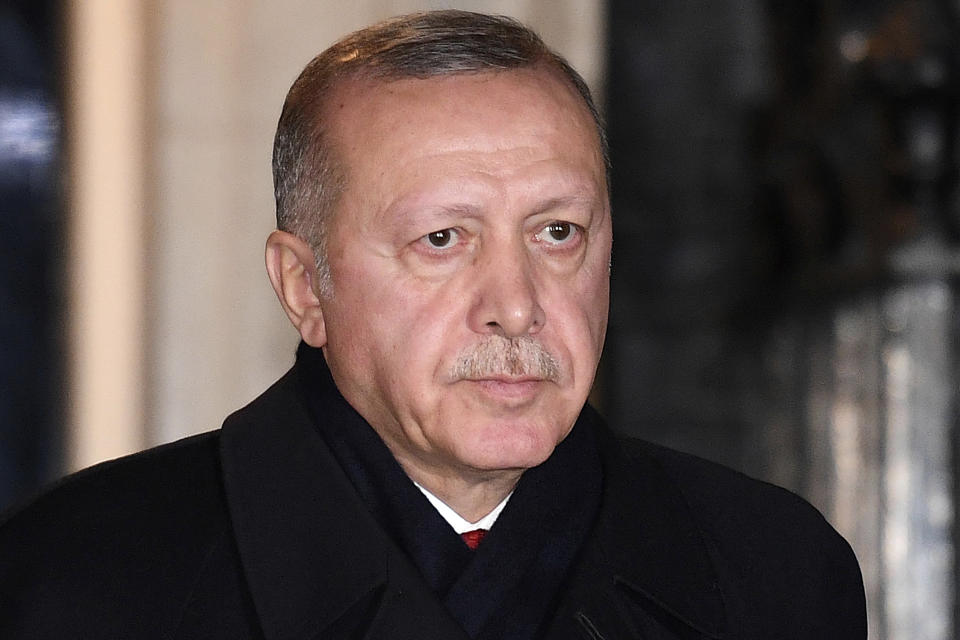 Turkey's President Recep Tayyip Erdogan leaves 10 Downing Street after meeting with Britain's Prime Minister Boris Johnson and other heads of State, ahead of the NATO summit, in London, Tuesday, Dec. 3, 2019. U.S. President Donald Trump and his NATO counterparts were gathering in London Tuesday to mark the alliance's 70th birthday amid deep tensions as spats between leaders expose a lack of unity that risks undermining military organization's credibility. (Daniel Leal-Olivas/Pool Photo via AP)