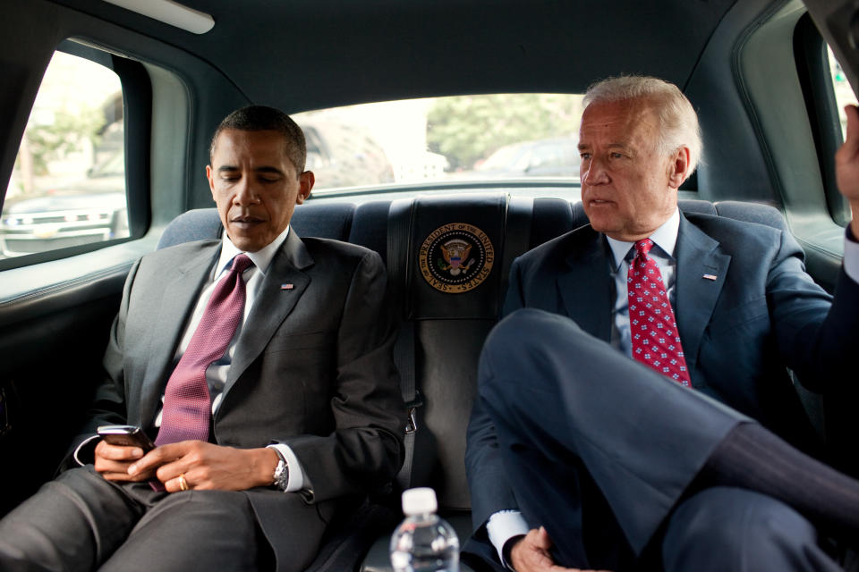 President Barack Obama and Vice President Joe Biden ride in the motorcade from the White House to the Ronald Reagan Building in Washington, D.C., July 21, 2010, to sign the Dodd-Frank Wall Street Reform and Consumer Protection Act.  (Official White House Photo by Pete Souza)  This official White House photograph is being made available only for publication by news organizations and/or for personal use printing by the subject(s) of the photograph. The photograph may not be manipulated in any way and may not be used in commercial or political materials, advertisements, emails, products, promotions that in any way suggests approval or endorsement of the President, the First Family, or the White House.