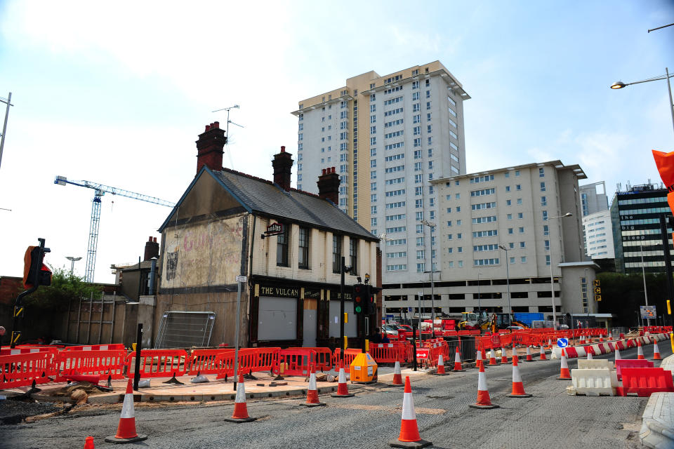 A beloved pub was knocked down - and moved brick-by-brick ten miles to be rebuilt inside a MUSEUM.  The Vulc<an pub served generations of boozers in Cardiff for more than 160 years only to be demolished for a shopper's car park.  More than 5,000 campaigners signed a petition to save it - and now their wish will come true.  Pictured here being rebuilt at St Fagans museum.  Â© WALES NEWS SERVICE    