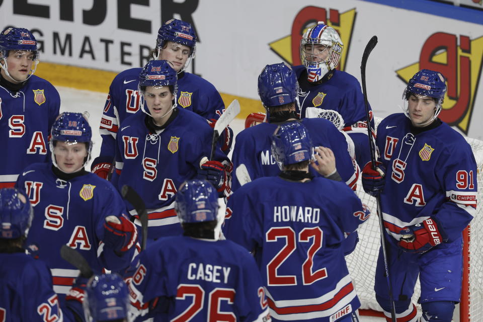 Team USA celebrates victory after the IIHF World Junior Championship group B ice hockey match between USA and Norway at Frolundaborg in Gothenburg, Sweden, Tuesday, Dec. 26, 2023. (Adam Ihse /TT News Agency via AP)