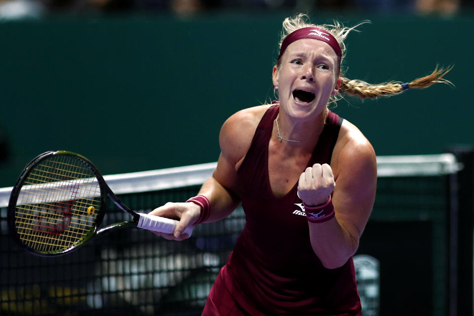 Kiki Bertens celebrates beating Angelique Kerber in her debut singles match at the WTA Finals Singapore. PHOTO: Reuters/Edgar Su