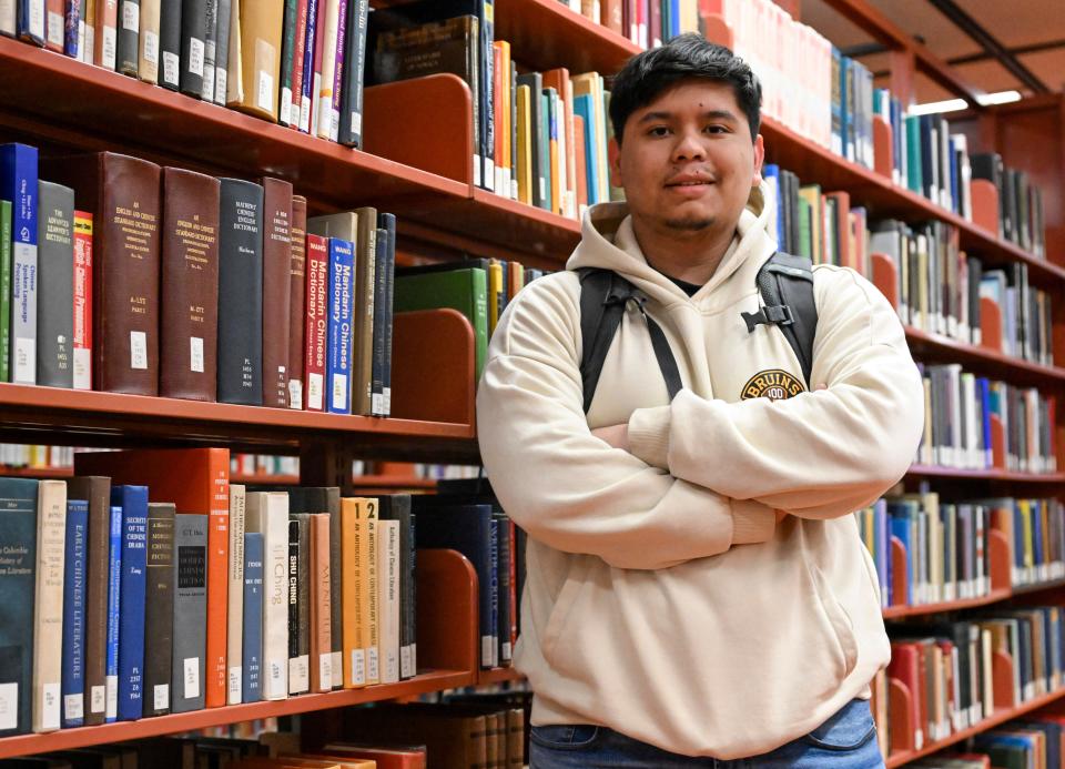 Jesus Noyola, a sophomore attending Rensselaer Polytechnic Institute, poses for a portrait in the Folsom Library, Tuesday, Feb. 13, 2024, in Troy, N.Y. A later-than-expected rollout of a revised Free Application for Federal Student Aid, or FASFA, that schools use to compute financial aid, is resulting in students and their parents putting off college decisions. Noyola said he hasn’t been able to submit his FAFSA because of an error in the parent portion of the application.