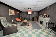 <p><span>81 Charleston Rd., Toronto, Ont.</span><br> Relax in the finished rec room down in the basement.<br> (Photo: Zoocasa) </p>