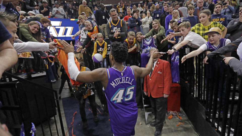 Utah Jazz guard Donovan Mitchell (45) walks off the court following the team's NBA basketball game against the Golden State Warriors on Friday, Nov. 22, 2019, in Salt Lake City. (AP Photo/Rick Bowmer)