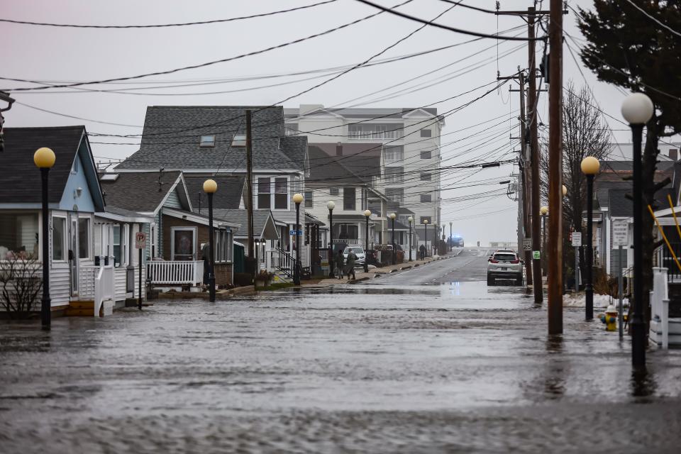 The west end of Highland Avenue flooded due to the high tide on Saturday, Jan. 13, 2024, at Hampton Beach.