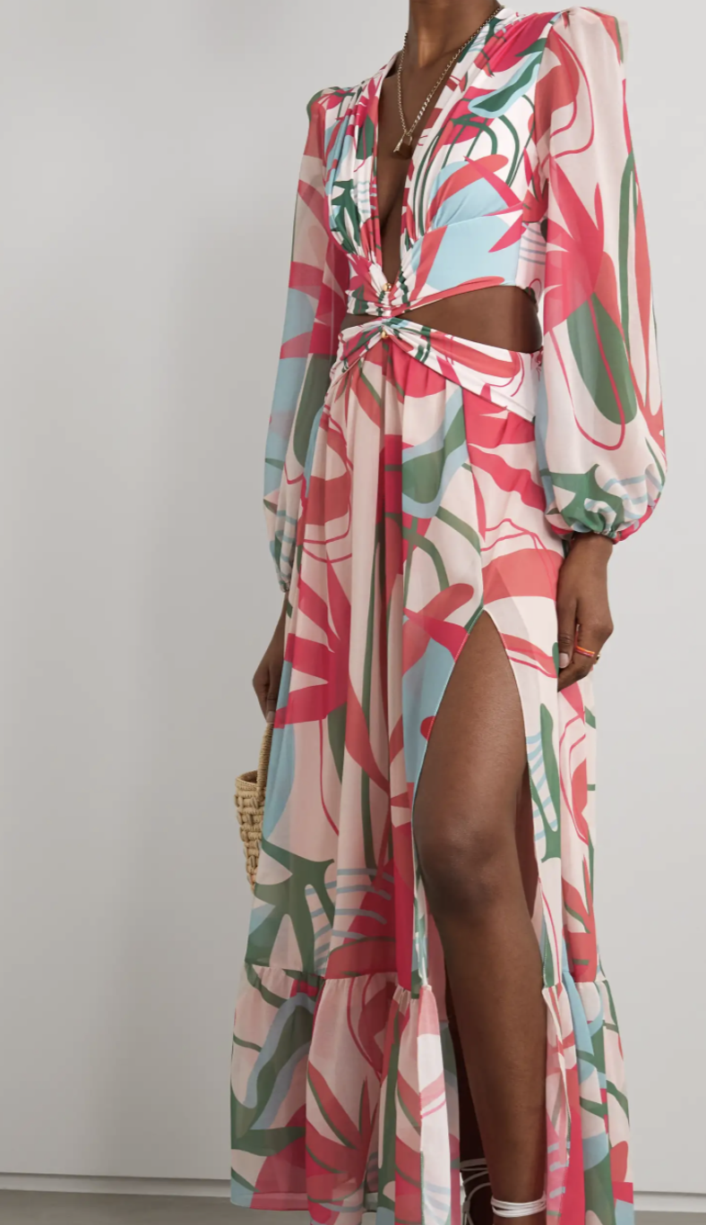 Body of a model shown in pink, blue and green on pale pink background dress, a Patbo Rio cutout floral-print stretch-jersey and chiffon maxi dress $1095.98