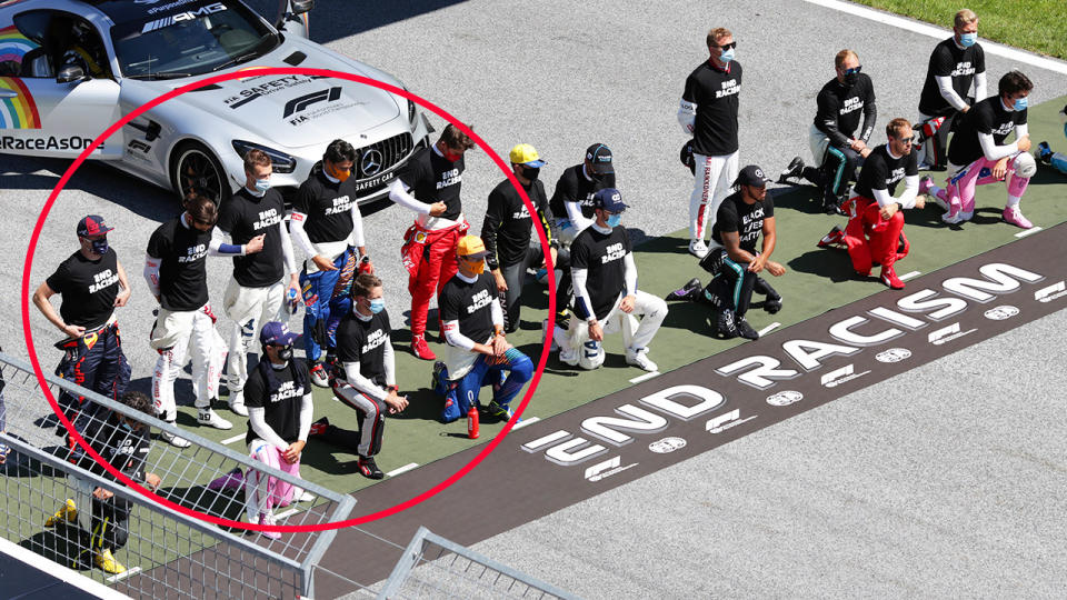 Six drivers, pictured here refusing to take a knee before the Austrian Grand Prix.