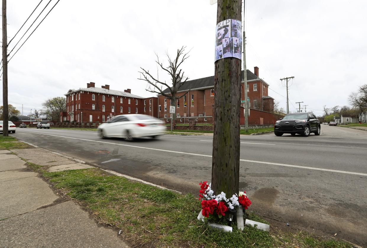 A makeshift memorial is placed at the bottom of a utility pole at the intersection of 24th and Bank streets in Louisville, Ky.. on March 26, 2024. A Louisville Metro Police Department officer fatally struck a 17-year-old boy with an unmarked police vehicle at this intersection on March 13.