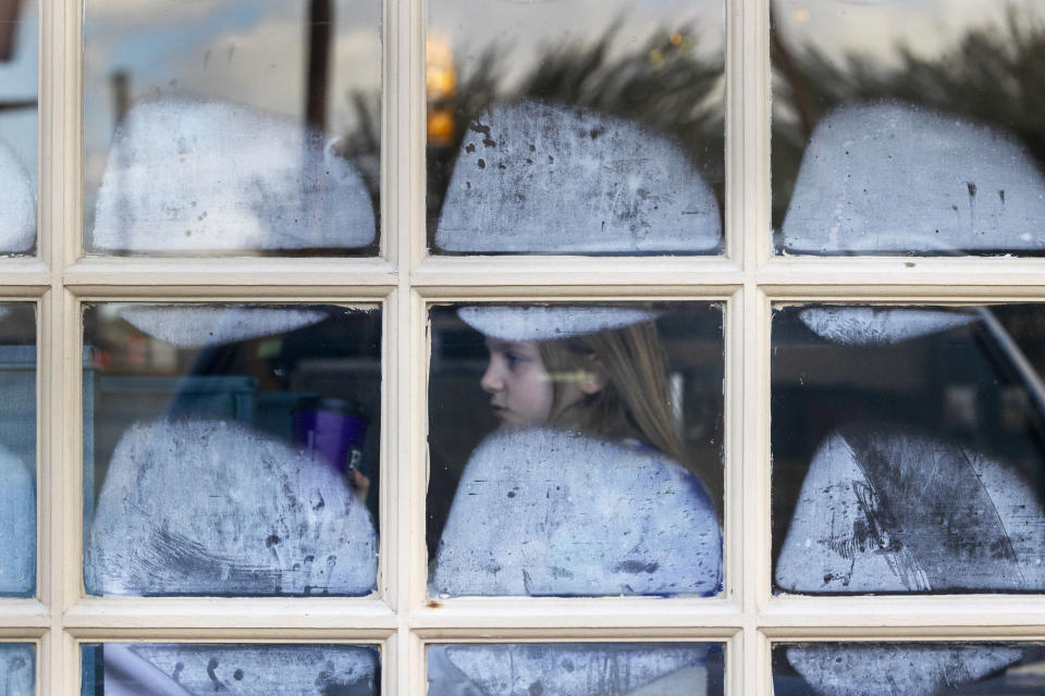 Frost forms on a window at a coffee shop in New Orleans during wintry, freezing weather on Tuesday, Jan. 16, 2024. (Chris Granger/The Times-Picayune/The New Orleans Advocate via AP)